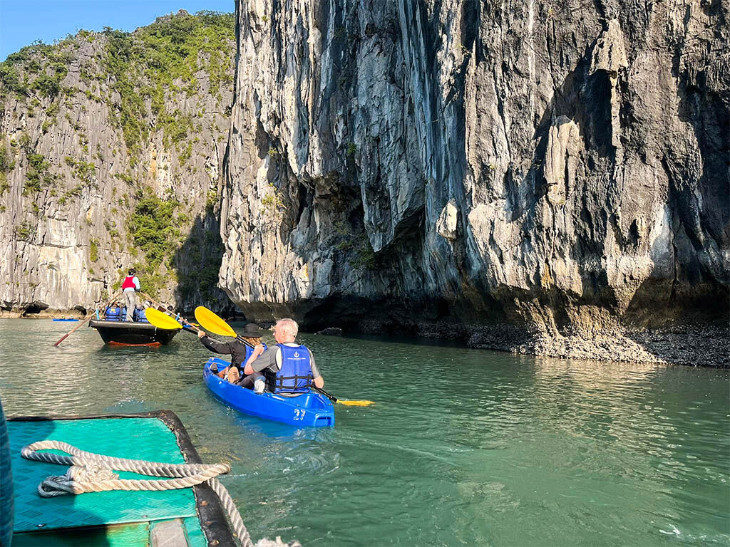 Paddle through hidden lagoons on exclusive Halong Bay Tours